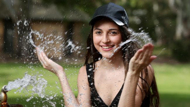 Ivana Barolo, from Rostrevor in eastern Adelaide, shows how she intends to keep cool when she attends the Stereosonic festival in South Australiaâ€™s capital today. Temperatures are expected to reach 40C. photo Calum Robertson